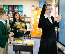 Nun teaching catholic school students