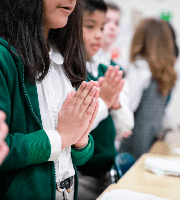 Catholic School students praying